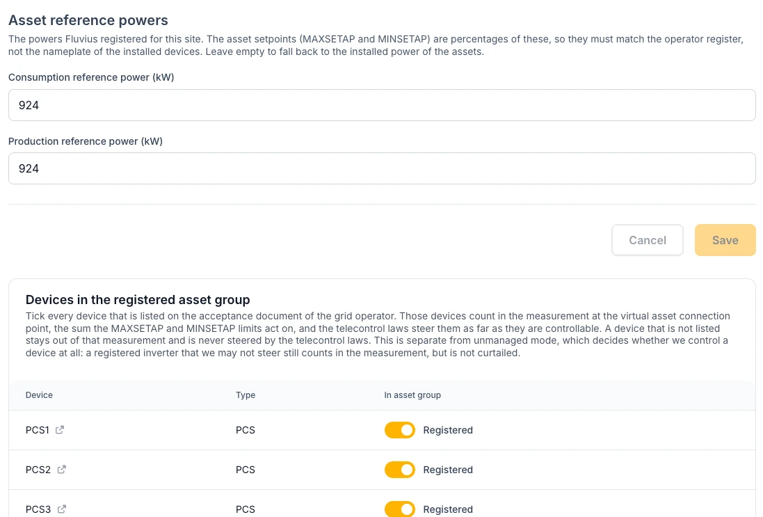 The telecontrol settings with the asset reference powers for consumption and production, and the table of devices in the registered asset group with a Registered switch per device.