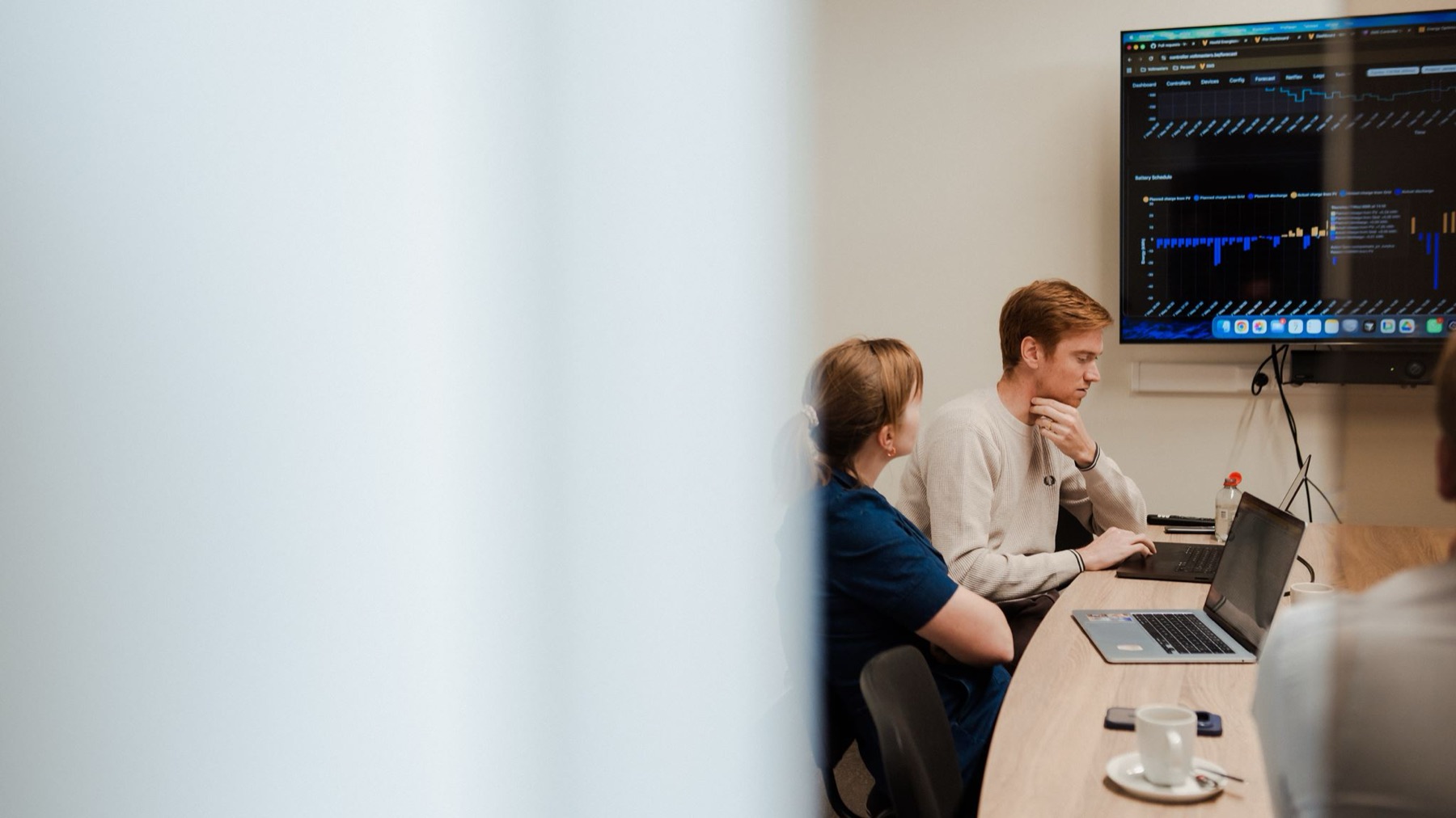 The Voltmasters team following the live dashboards of an installation at the office
