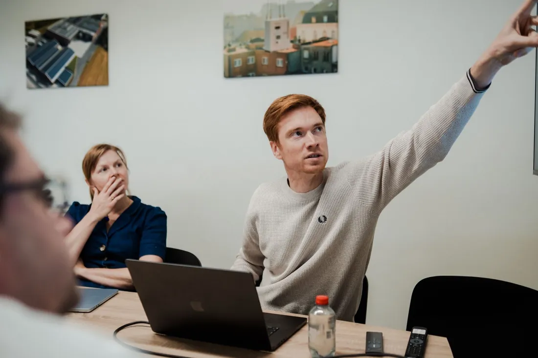 The Voltmasters team in a working session at the office